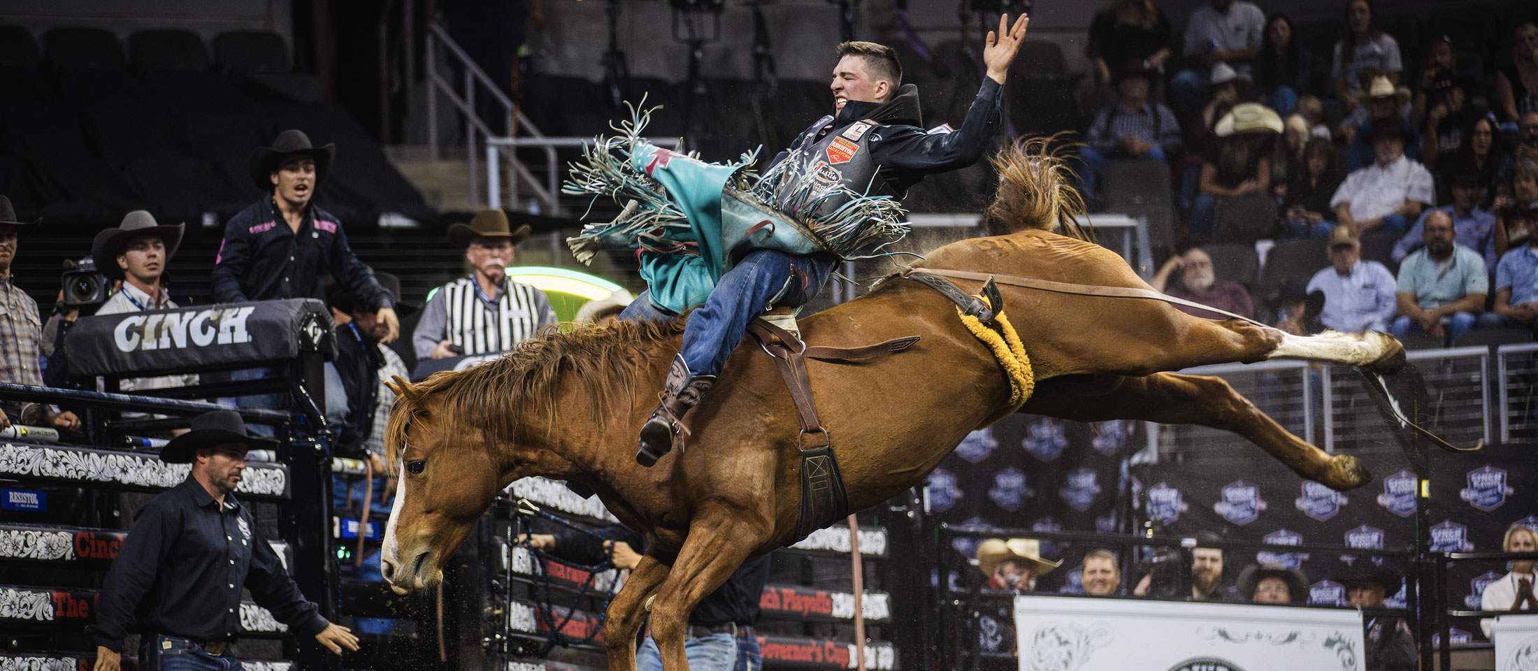 Jess Pope on a horse at a rodeo.